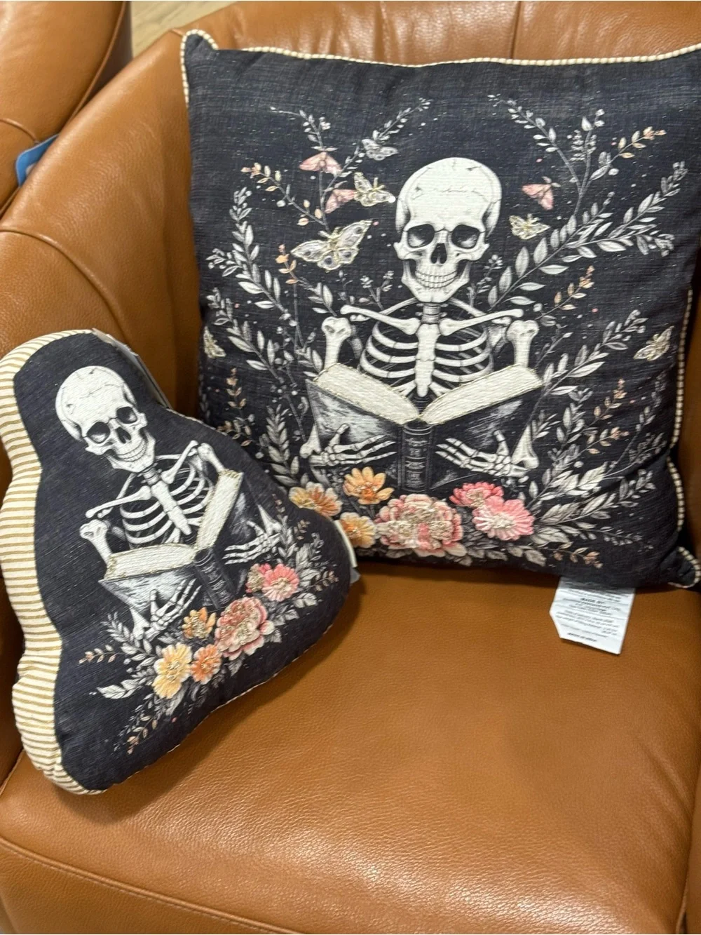2 Skeleton Reading Floral Throw Pillows - Black